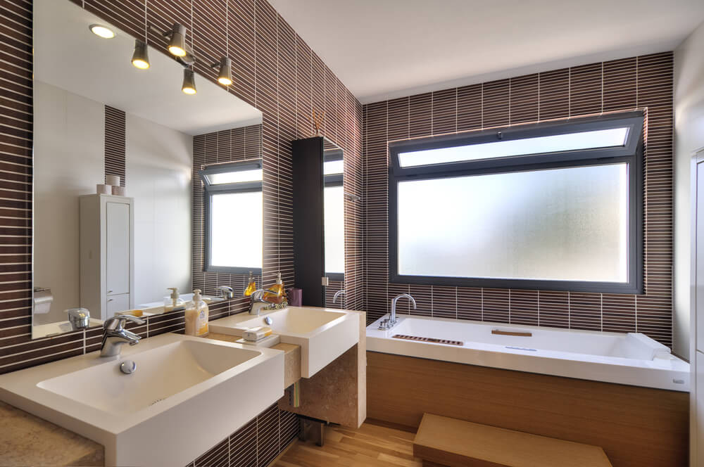 Bathroom with large back frame frosted window