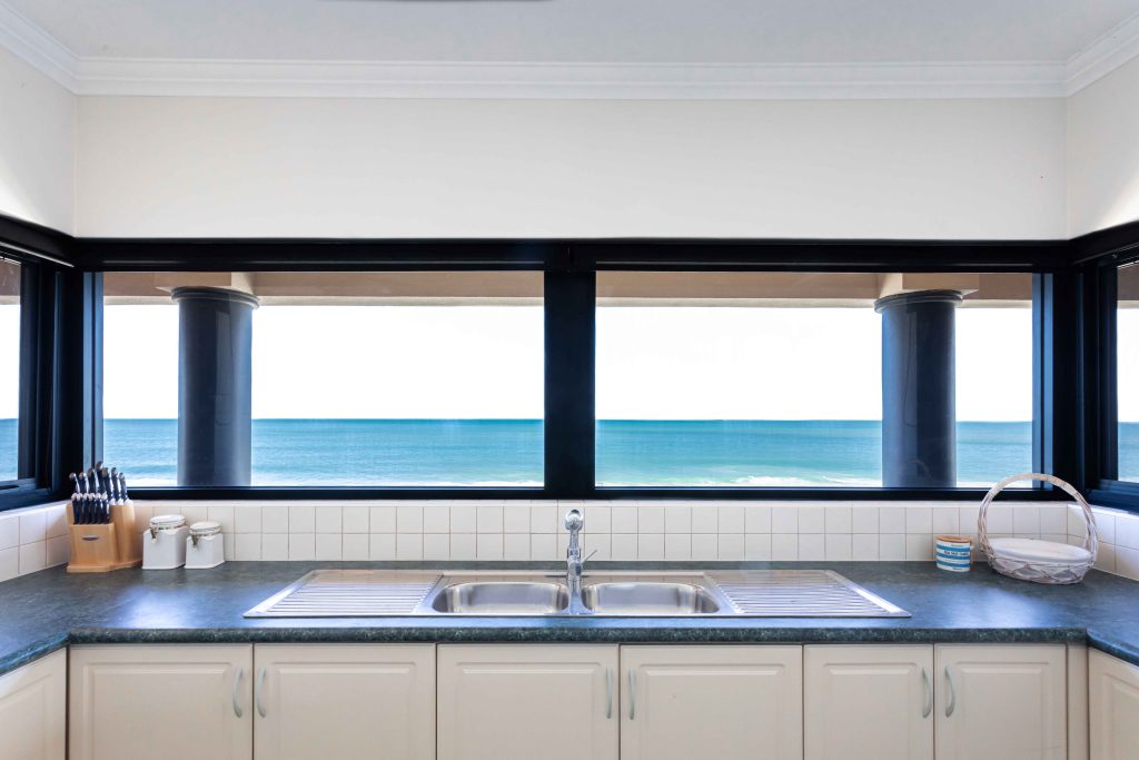 Kitchen windows with flyscreens